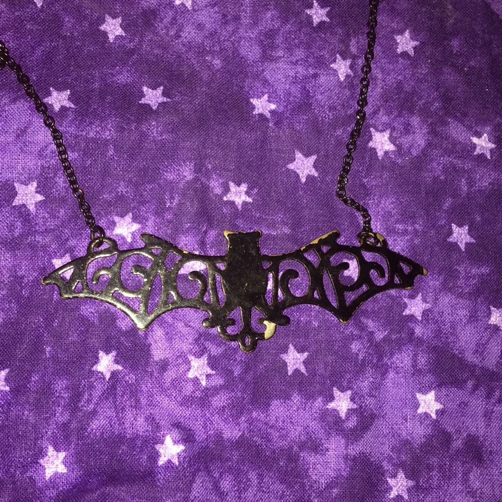 Vintage looking bat necklace